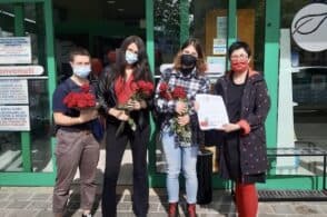 Una rosa rossa per i diritti dei cassieri dei supermercati: il 1° maggio in trincea della Cgil