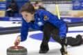 Il logo della Dmo sulle divise azzurre del curling