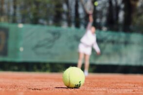 green lawn tennis ball on ground